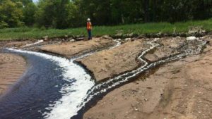Pulp effluent flows into beach at Indian Cross Point, Pictou County, NS